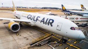 a large white airplane parked on a tarmac