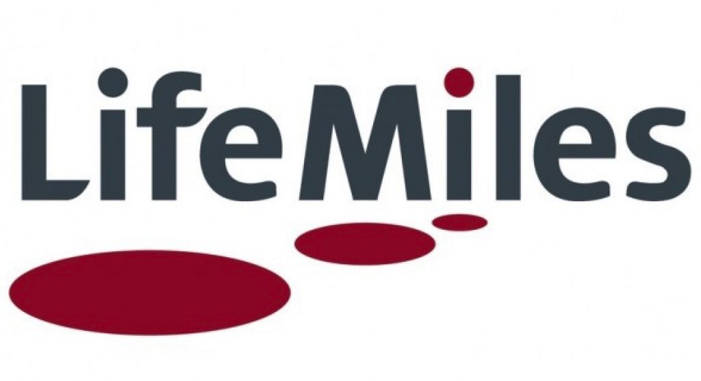 a logo with red dots