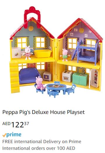 a toy house with a table and chairs